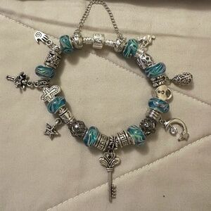 Handmade – NOWT – stainless steel charm bracelet. Lampwrk beads, variety charms